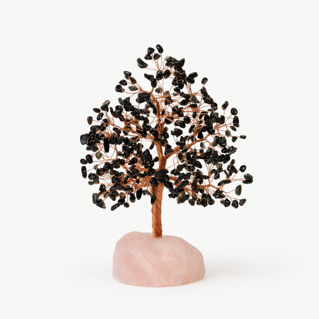 black tourmaline gemstone tree with copper wire branches on a polished rose quartz base