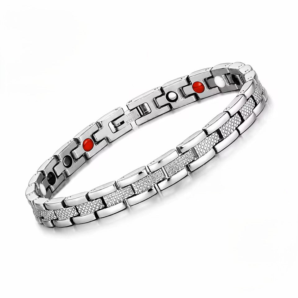 engraved bracelet in silver with textured links and red and black therapy inserts