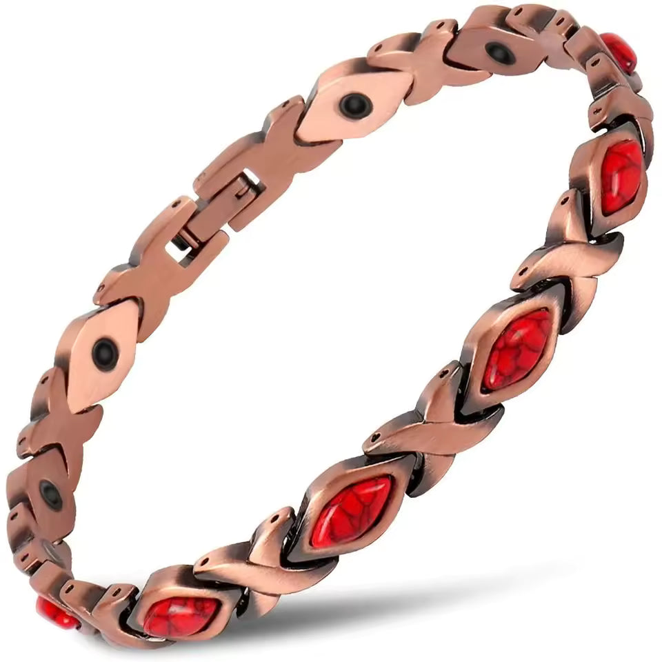 xoxo copper bracelet with red garnet marquise stones set between copper x links