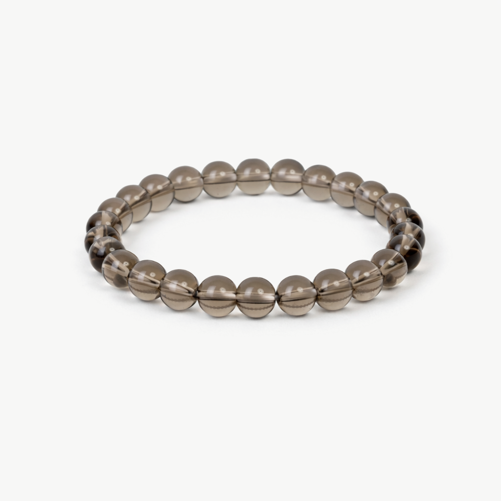 smoky quartz grounding beaded bracelet with translucent brown round stones on a stretch cord
