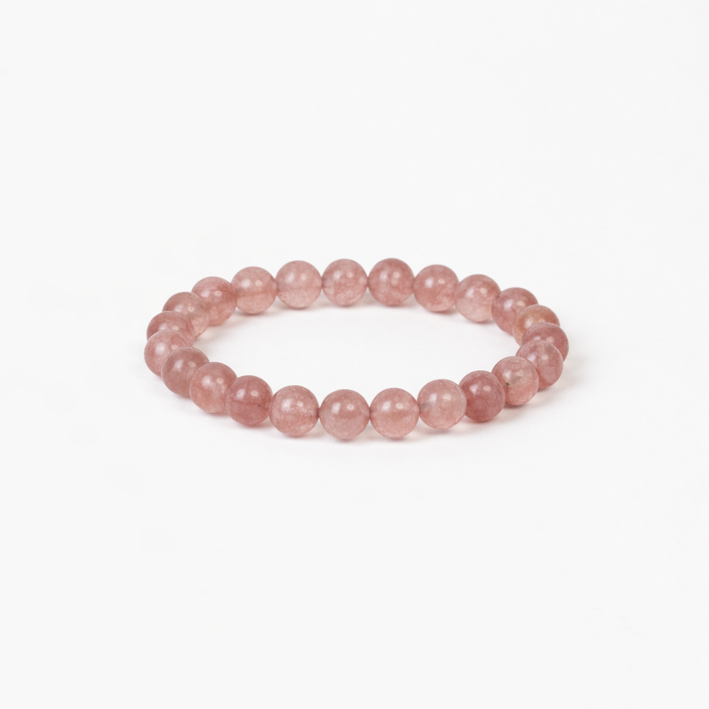 strawberry quartz love beaded bracelet with soft pink round stones on a stretch cord