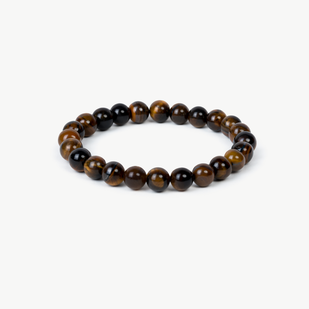 tiger's eye beaded bracelet with golden-brown banded round stones on a stretch cord, on a white background