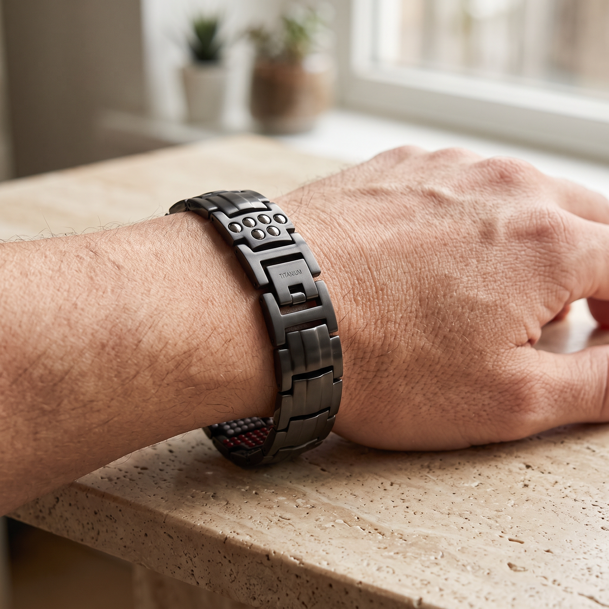 6x titanium bracelet black worn on the wrist