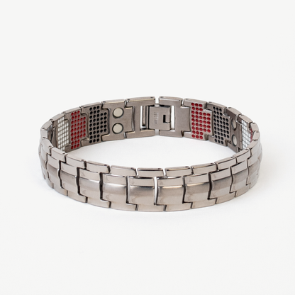 6X Power Premium Silver wellness bracelet with brushed steel links and red therapy inserts