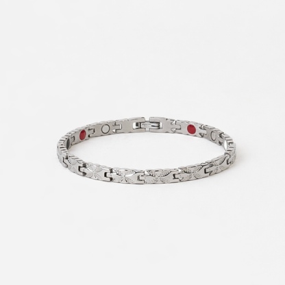Butterfly Silver bracelet with patterned links and red therapy inserts on a white background