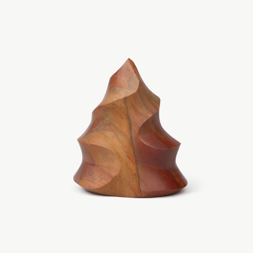 Tiger's eye sculpted mineral decor piece carved in a flame shape with a matte finish