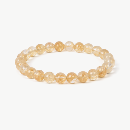 Citrine Radiance beaded bracelet with warm honey-gold round stones on a stretch cord