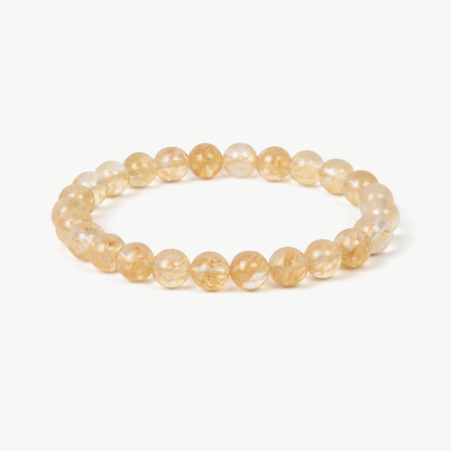 Citrine Radiance beaded bracelet with warm honey-gold round stones on a stretch cord