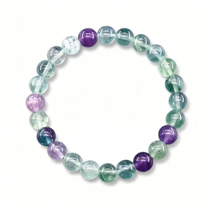 Fluorite Balance beaded bracelet with green, purple and clear fluorite stones on a white background