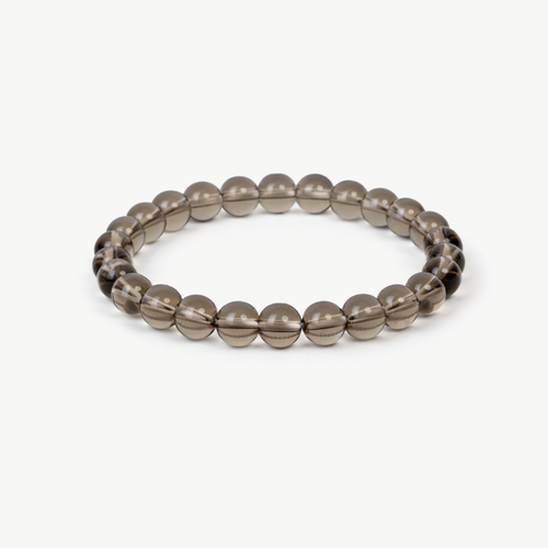 Smoky Quartz Grounding beaded bracelet with translucent brown round stones on a stretch cord