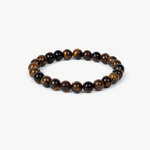 Tiger's Eye beaded bracelet with golden-brown banded round stones on a stretch cord, on a white background
