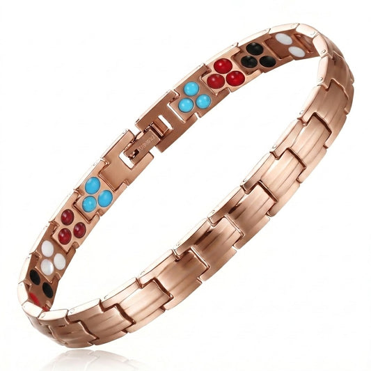 A rose gold link bracelet with colorful gemstone accents in blue, red, black, and white, displayed on a clean white background.