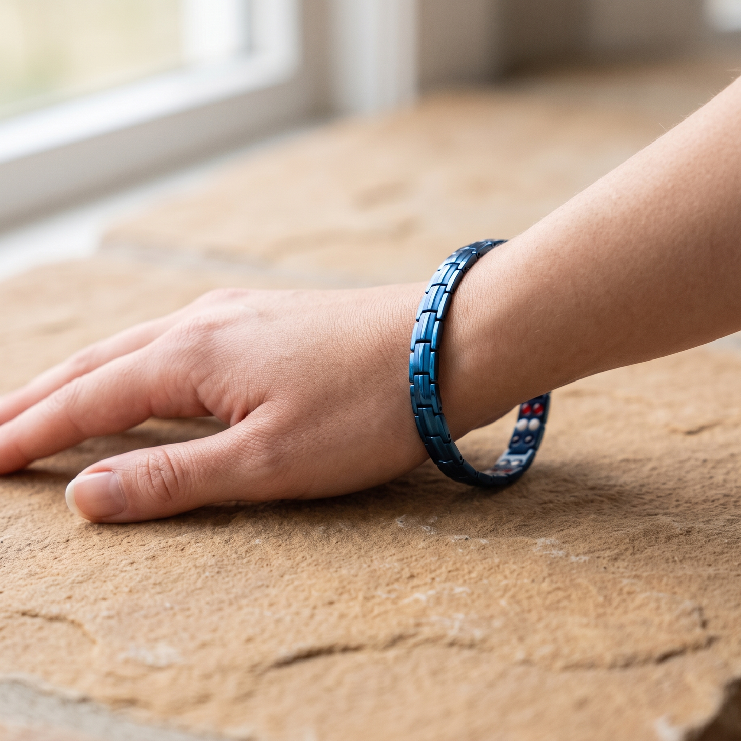 2x thin design blue bracelet worn on the wrist