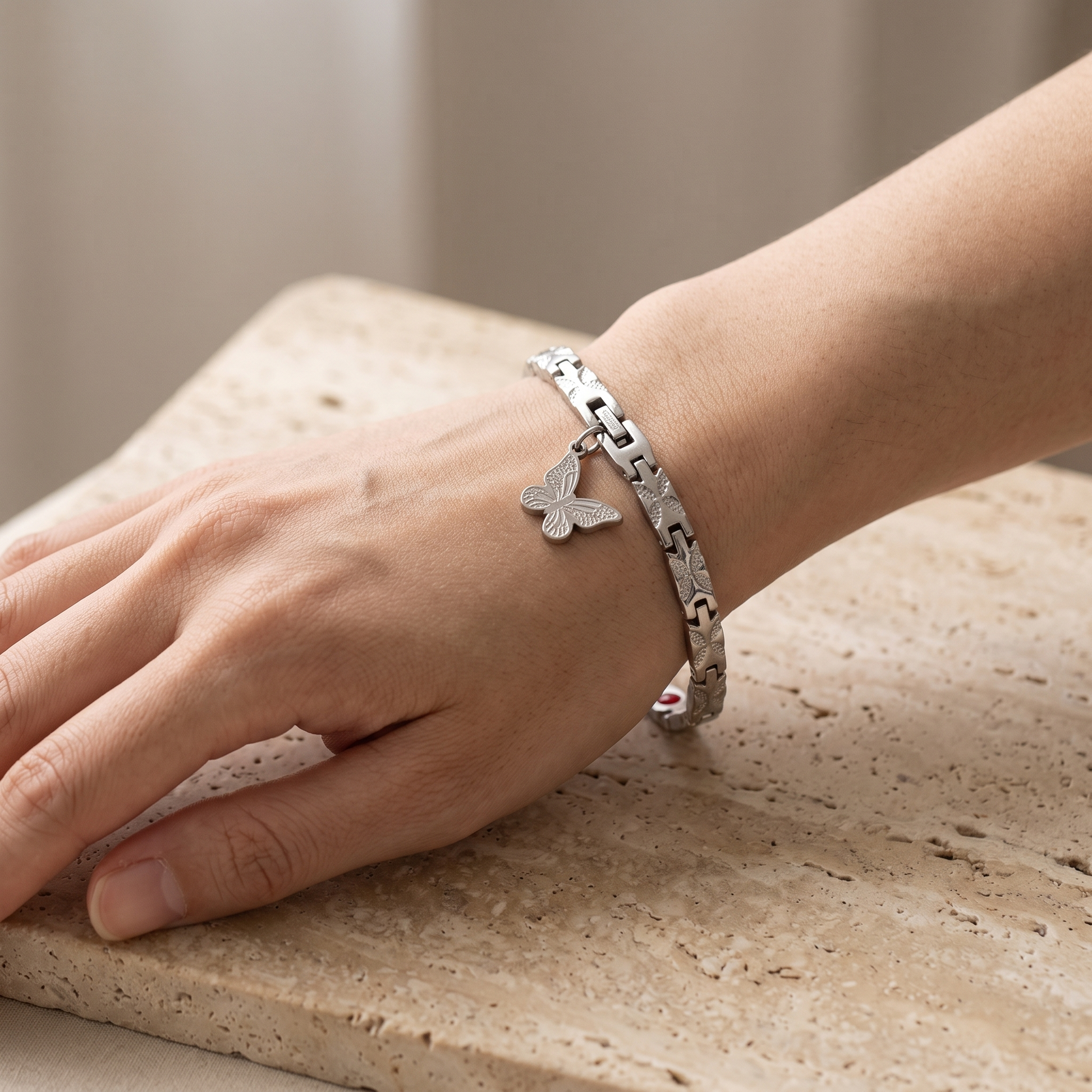 Butterfly Silver bracelet worn on the wrist